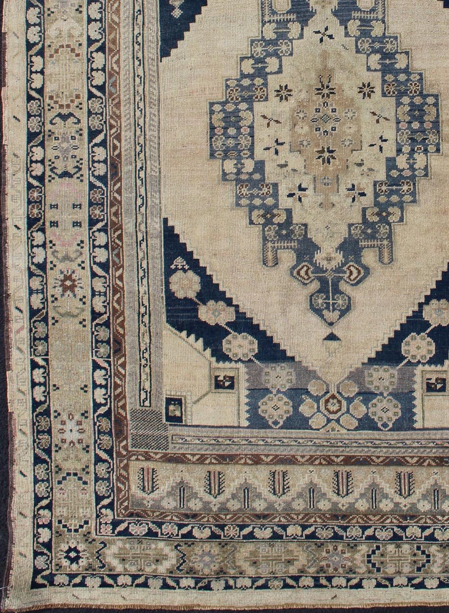 Blue, Brown, and Cream Hand Knotted Turkish Oushak Rug Vintage With Medallion Design Vintage Oushak carpet with medallion design, rug TU - DUR - 4814, country of origin / Keivan Woven Arts type: Turkey / Oushak, circa 1940 This vintage Ousha... - Keivan Woven ArtsTU - DUR - 4814 - 10752Rug