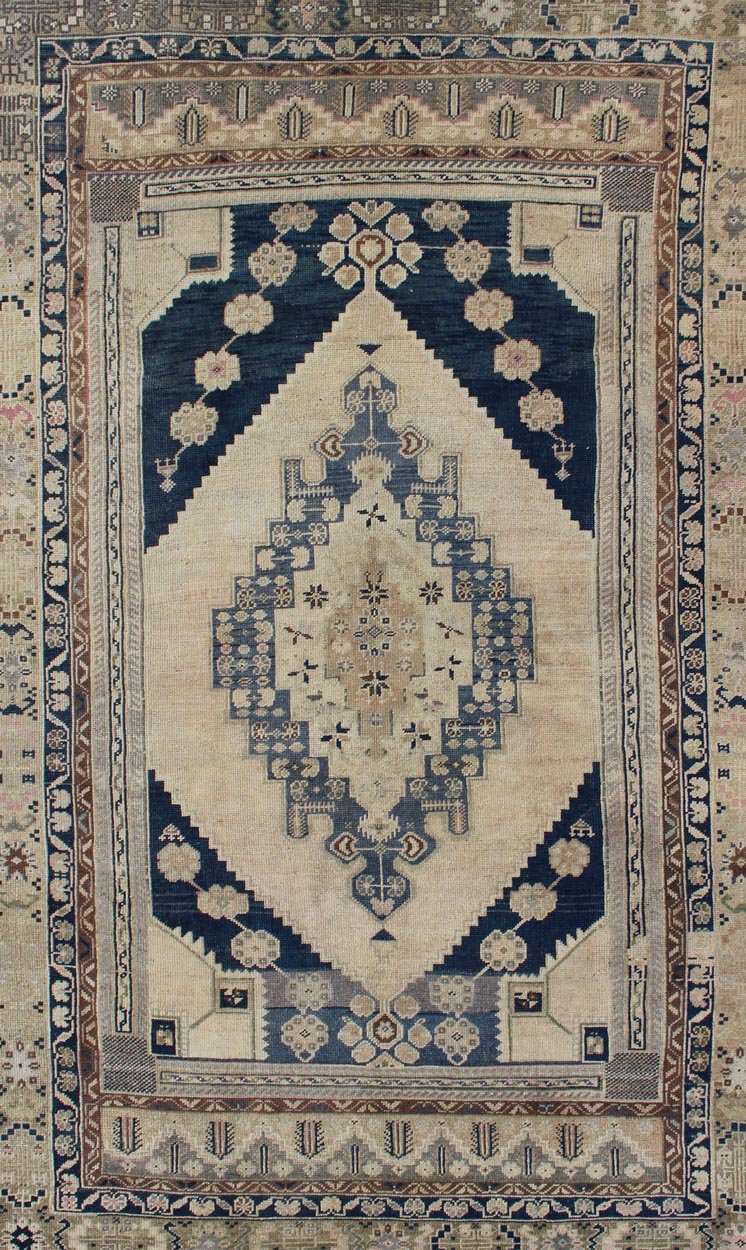 Blue, Brown, and Cream Hand Knotted Turkish Oushak Rug Vintage With Medallion Design Vintage Oushak carpet with medallion design, rug TU - DUR - 4814, country of origin / Keivan Woven Arts type: Turkey / Oushak, circa 1940 This vintage Ousha... - Keivan Woven ArtsTU - DUR - 4814 - 10752Rug