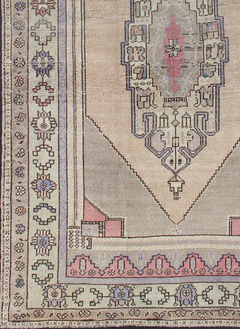 Muted Turkish Oushak with Stretched Medallion Design Medallion Design Oushak Rug from Turkey, rug TU - DUR - 4815, country of origin / type: Turkey / Oushak, circa 1940 This vintage Turkish Oushak rug features a stretched medallion design in ... - Keivan Woven ArtsTU - DUR - 4815 - 10756Rug