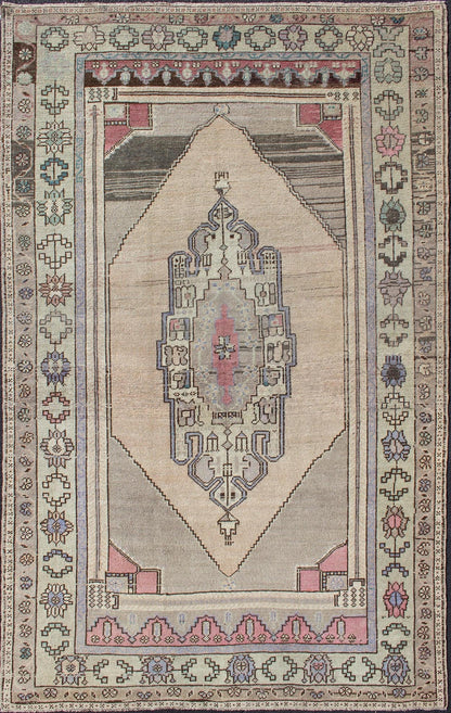 Muted Turkish Oushak with Stretched Medallion Design Medallion Design Oushak Rug from Turkey, rug TU - DUR - 4815, country of origin / type: Turkey / Oushak, circa 1940 This vintage Turkish Oushak rug features a stretched medallion design in ... - Keivan Woven ArtsTU - DUR - 4815 - 10756Rug