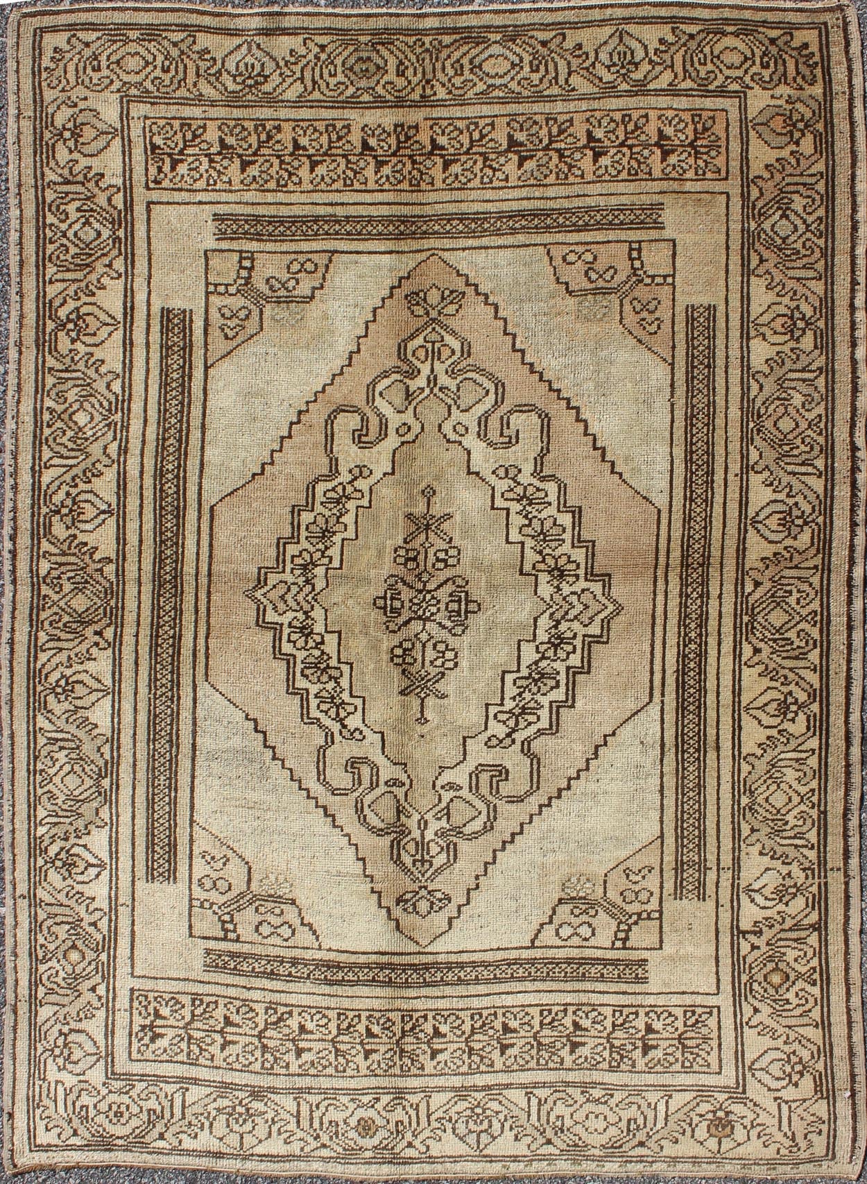 Vintage Turkish Oushak Carpet with Stylized Design in Brown, Cream, and Tan Measures 4 x 5'7 This Oushak rug features an intricately beautiful design. The central medallion is complemented by a defining border featuring a symmetrical set... - Keivan Woven ArtsTU - DUR - 504 - 3497Rug