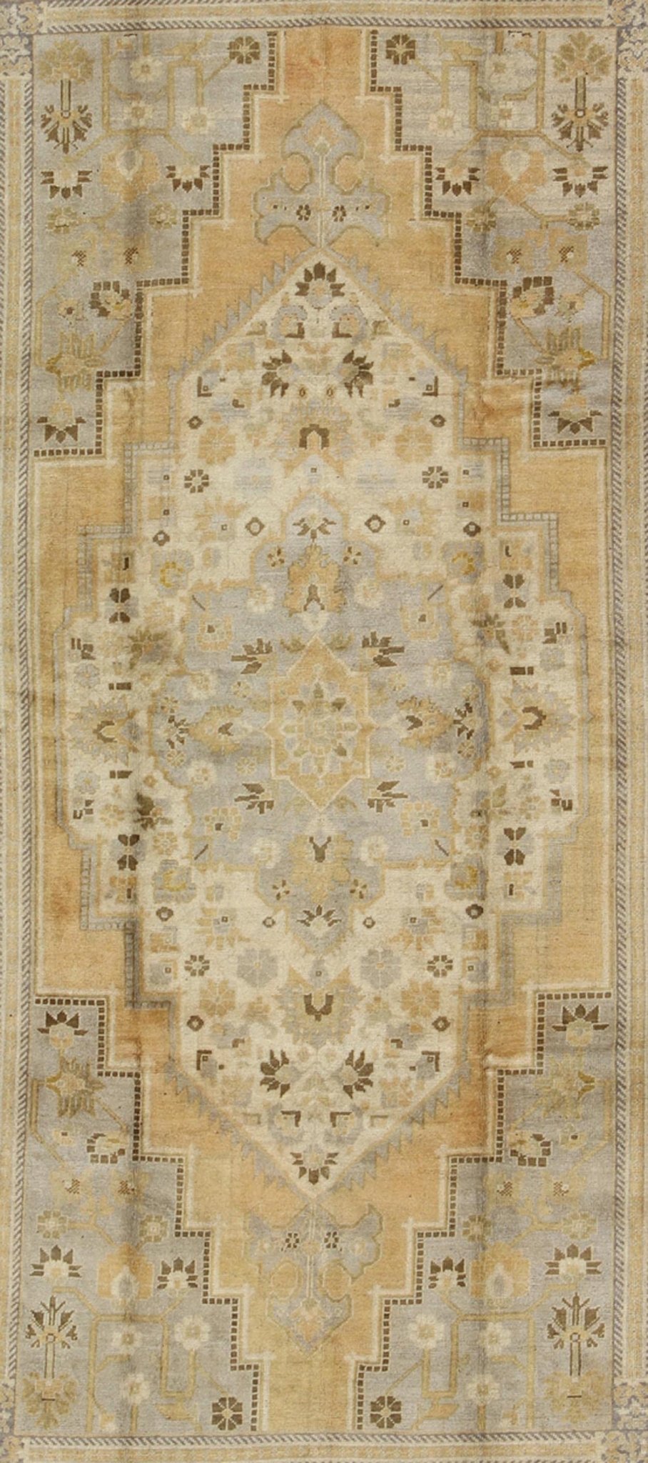 Vintage Turkish Medallion Oushak Rug in Gold, Taupe, Cream and Cocoa Measures: 6'8 x 12 This vintage Turkish Oushak features a bold design softened by unique, light tones. The border is chocolate brown and contains vines and flowers. Co... - Keivan Woven ArtsTU - DUR - 507 - 3508Rug