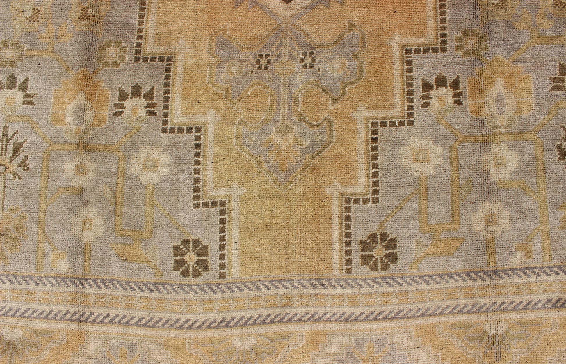 Vintage Turkish Medallion Oushak Rug in Gold, Taupe, Cream and Cocoa Measures: 6'8 x 12 This vintage Turkish Oushak features a bold design softened by unique, light tones. The border is chocolate brown and contains vines and flowers. Co... - Keivan Woven ArtsTU - DUR - 507 - 3508Rug