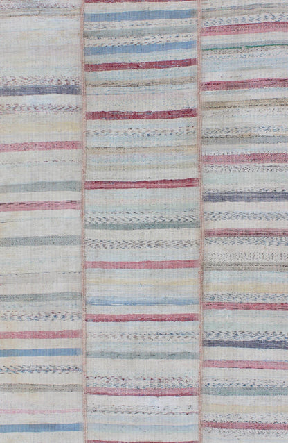 Multi - Panel Vintage Turkish Flat Weave Rug in Pink, Blue, Green and Cream This multi - paneled, striped Kilim is an example of Provincial minimalism that has conformed to a more modern design. Individual panels are woven together to accentuate the... - Keivan Woven ArtsTU - EMD - 11605 - 2886Rug
