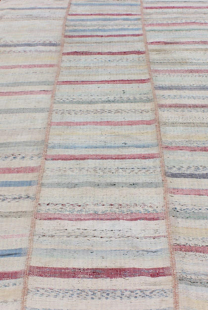 Multi - Panel Vintage Turkish Flat Weave Rug in Pink, Blue, Green and Cream This multi - paneled, striped Kilim is an example of Provincial minimalism that has conformed to a more modern design. Individual panels are woven together to accentuate the... - Keivan Woven ArtsTU - EMD - 11605 - 2886Rug