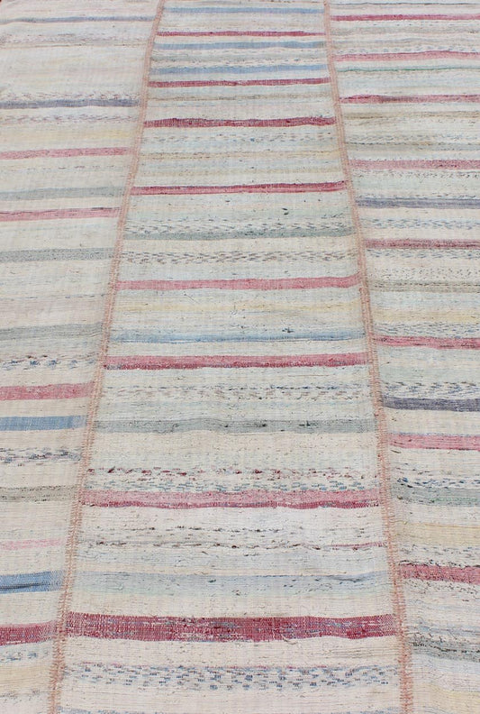 Multi - Panel Vintage Turkish Flat Weave Rug in Pink, Blue, Green and Cream This multi - paneled, striped Kilim is an example of Provincial minimalism that has conformed to a more modern design. Individual panels are woven together to accentuate the... - Keivan Woven ArtsTU - EMD - 11605 - 2886Rug