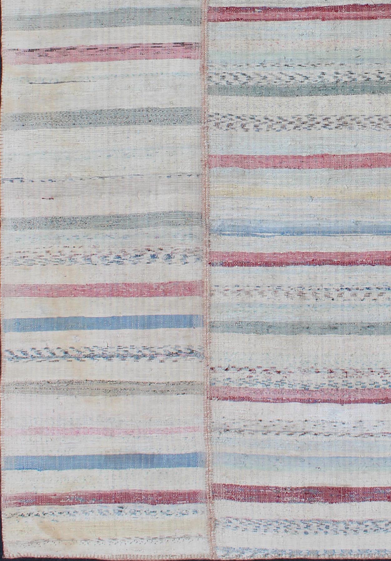 Multi - Panel Vintage Turkish Flat Weave Rug in Pink, Blue, Green and Cream This multi - paneled, striped Kilim is an example of Provincial minimalism that has conformed to a more modern design. Individual panels are woven together to accentuate the... - Keivan Woven ArtsTU - EMD - 11605 - 2886Rug