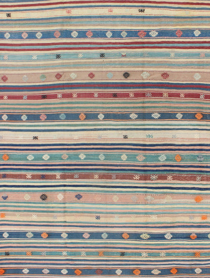 Colorful Vintage Turkish Kilim Rug with Horizontal Stripes and Tribal Designs, rug emd - 136530, country of origin / type: Turkey / Kilim, circa mid - 20th century Featuring tribal shapes with a spotted and speckled assortment of geometric elements,... - Keivan Woven ArtsTU - EMD - 136530 - 4938Rug