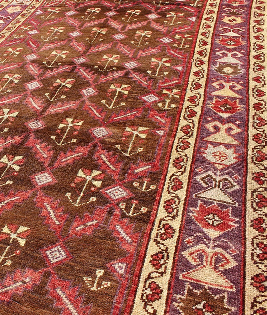 Vintage Turkish Oushak Carpet with All - Over Tribal Design in Red, Purple & Brown: Produced in mid - 20th century Turkey, this vintage Oushak is characterized by a comely and highly representative Oushak composition. Building on traditional designs, this ... - Keivan Woven ArtsTU - EMD - 3368 - 6161Rug