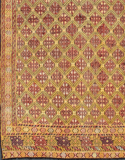 Vintage Turkish Embroidered Kilim Rug With Diamond Design in Yellow and Red This colorful vintage, 20th century embroidered Kilim rug features an all - over diamond pattern woven with a well - preserved and vibrant color palette of Green, soft orange, ... - Keivan Woven ArtsTU - EMD - 3371 - 6165Rug