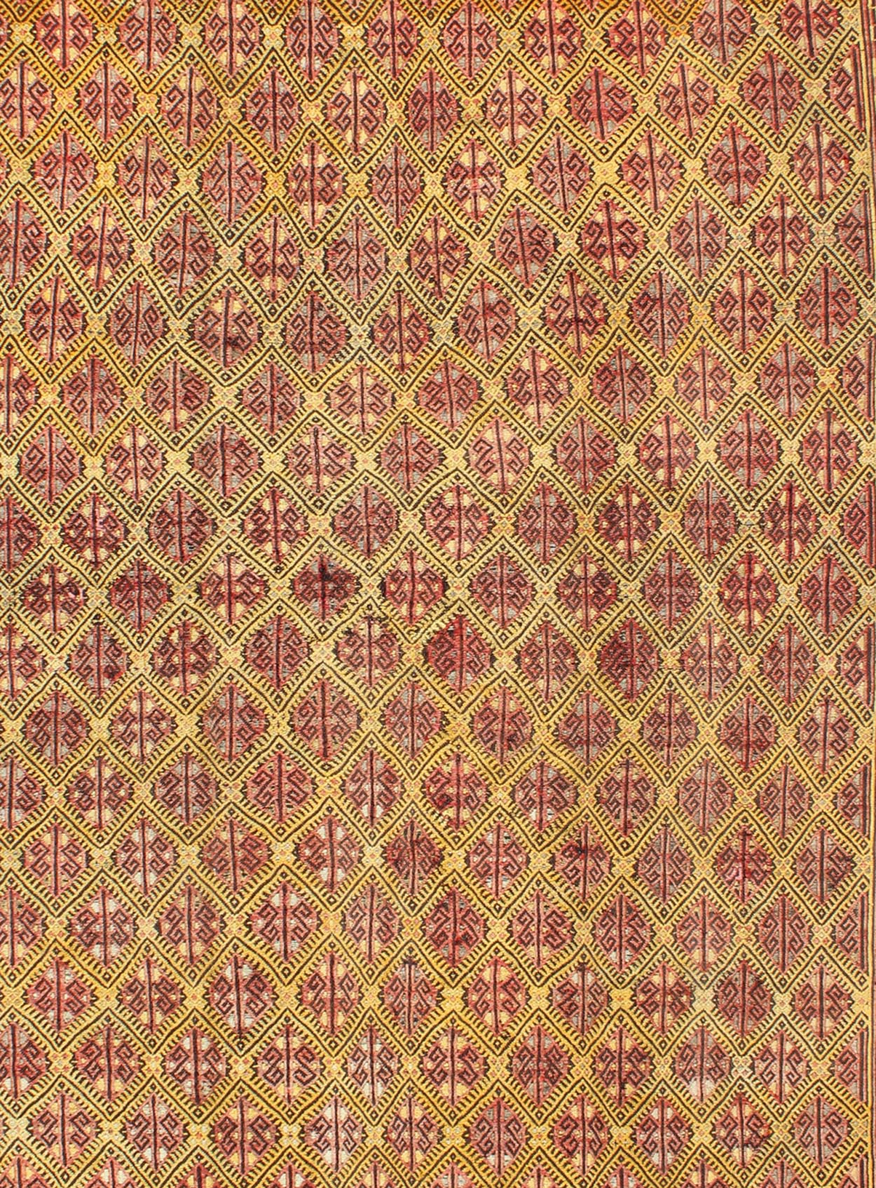 Vintage Turkish Embroidered Kilim Rug With Diamond Design in Yellow and Red This colorful vintage, 20th century embroidered Kilim rug features an all - over diamond pattern woven with a well - preserved and vibrant color palette of Green, soft orange, ... - Keivan Woven ArtsTU - EMD - 3371 - 6165Rug