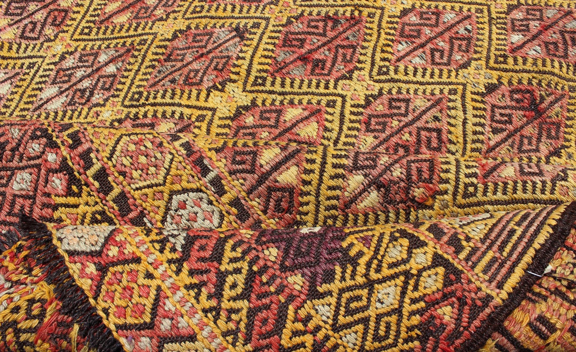 Vintage Turkish Embroidered Kilim Rug With Diamond Design in Yellow and Red This colorful vintage, 20th century embroidered Kilim rug features an all - over diamond pattern woven with a well - preserved and vibrant color palette of Green, soft orange, ... - Keivan Woven ArtsTU - EMD - 3371 - 6165Rug