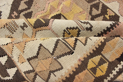 Vintage Turkish kilim gallery rug with tribal medallion design in pink and yellow. Keivan Woven Arts / rug TU - EMD - 3424, country of origin / type: Turkey / Kilim, circa Mid - 20th century. This vintage Turkish Kilim gallery rug (circa mid - 20th cent... - Keivan Woven ArtsTU - EMD - 3424 - 6171Rug