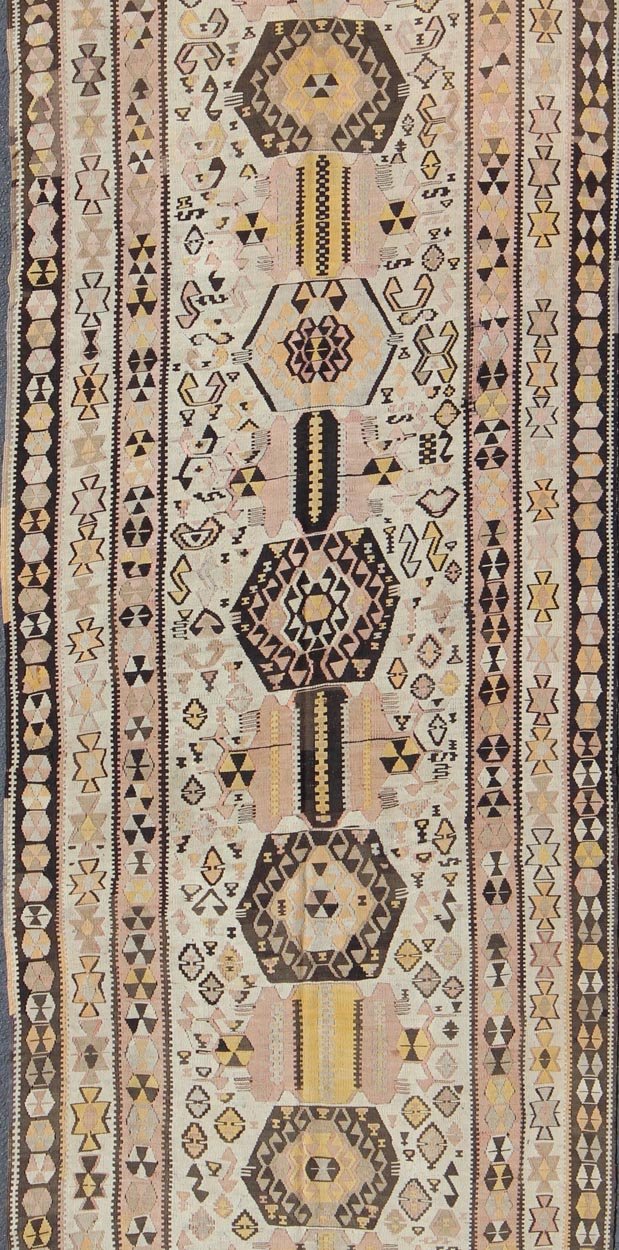 Vintage Turkish kilim gallery rug with tribal medallion design in pink and yellow. Keivan Woven Arts / rug TU - EMD - 3424, country of origin / type: Turkey / Kilim, circa Mid - 20th century. This vintage Turkish Kilim gallery rug (circa mid - 20th cent... - Keivan Woven ArtsTU - EMD - 3424 - 6171Rug
