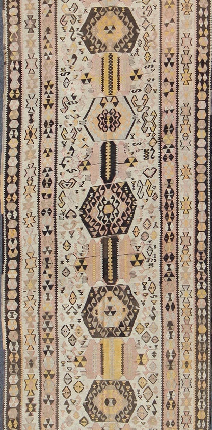 Vintage Turkish kilim gallery rug with tribal medallion design in pink and yellow. Keivan Woven Arts / rug TU - EMD - 3424, country of origin / type: Turkey / Kilim, circa Mid - 20th century. This vintage Turkish Kilim gallery rug (circa mid - 20th cent... - Keivan Woven ArtsTU - EMD - 3424 - 6171Rug
