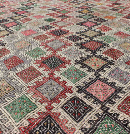 Geometric Embroidered Mid - Century Flat - Weave Kilim Rug From Turkey. This marvelous geometric embroidered Kilim rug showcases an all - over diamond pattern in the background and an understated border, paired with a distinct set of random colors such as pi... - Keivan Woven ArtsTU - EMD - 3427 - 6177Rug