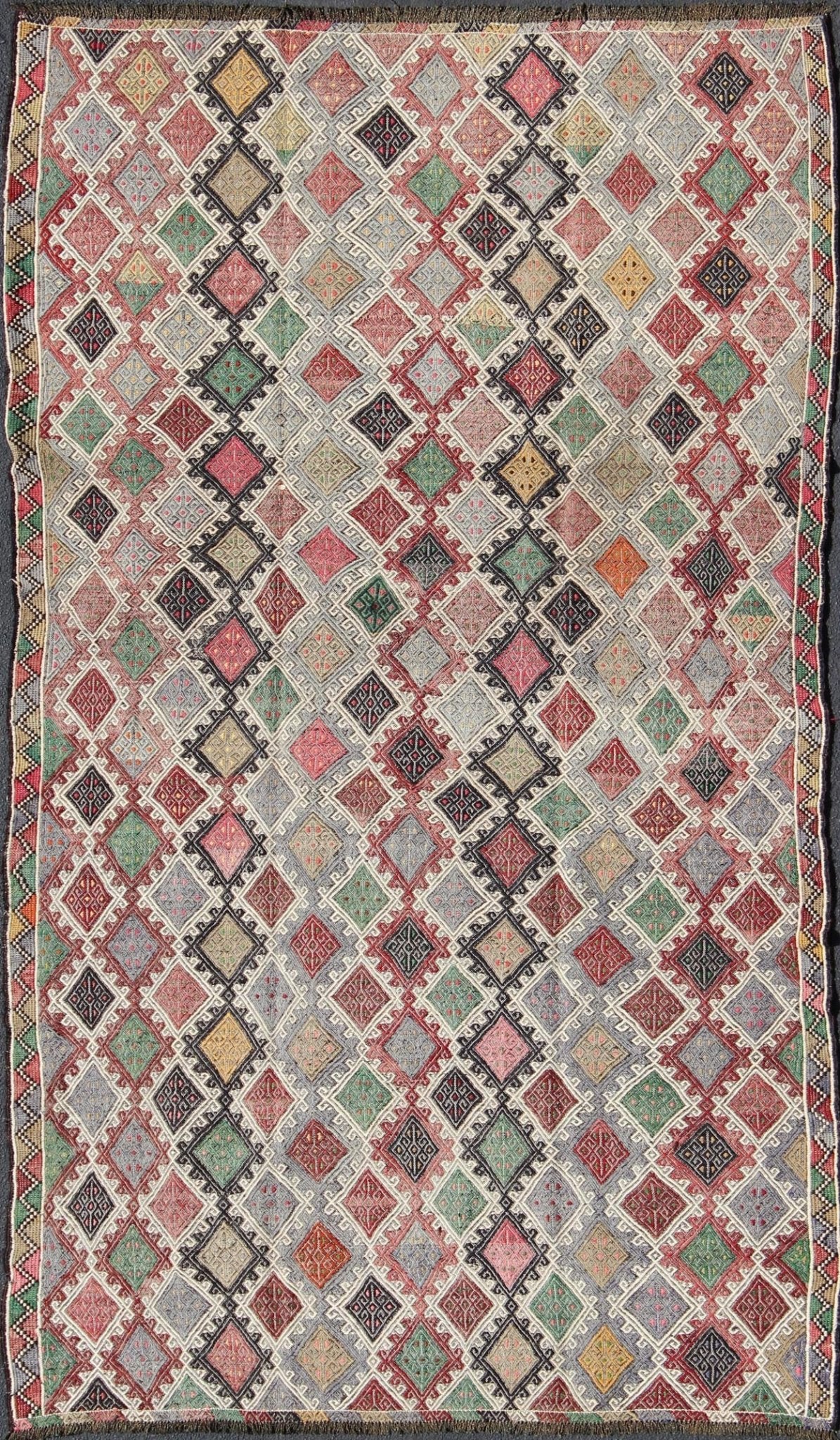 Geometric Embroidered Mid - Century Flat - Weave Kilim Rug From Turkey. This marvelous geometric embroidered Kilim rug showcases an all - over diamond pattern in the background and an understated border, paired with a distinct set of random colors such as pi... - Keivan Woven ArtsTU - EMD - 3427 - 6177Rug