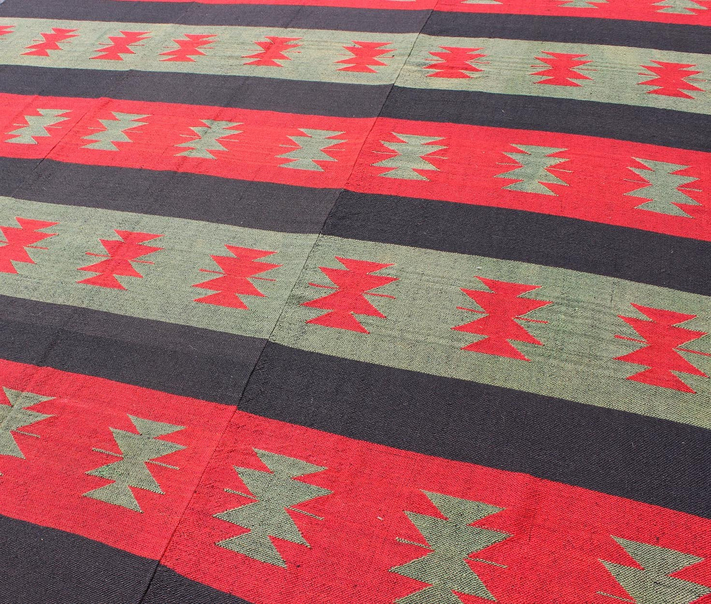 Vintage Turkish Kilim rug with tribal shapes and horizontal stripes in red and green, rug emd - 3428, country of origin / type: Turkey / Kilim, circa mid - 20th century. Featuring tribal shapes rendered in a repeating horizontal stripe design, this ... - Keivan Woven ArtsTU - EMD - 3428 - 6183Rug