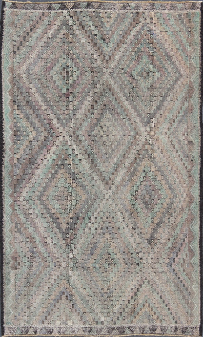 Vintage Jajeem Flat - Weave Rug - This unique Jajeem features a multitude of diamond shapes in the background combined with a simple outer border. The seemingly random use of pastel colors such as gray, light green, light yellow, brown, cream and lavender... - Keivan Woven ArtsTU - EMD - 95008 - 3469Rug