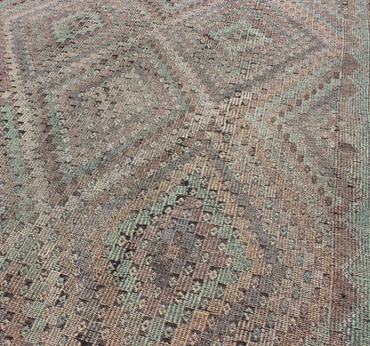 Vintage Jajeem Flat - Weave Rug - This unique Jajeem features a multitude of diamond shapes in the background combined with a simple outer border. The seemingly random use of pastel colors such as gray, light green, light yellow, brown, cream and lavender... - Keivan Woven ArtsTU - EMD - 95008 - 3469Rug