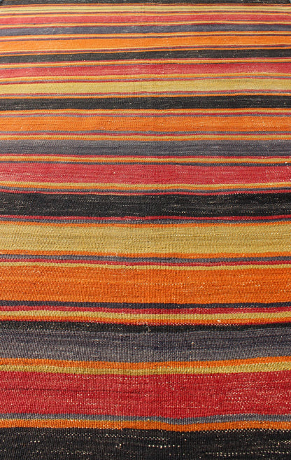 Multicolored Vintage Turkish Kilim rug with Horizontal Stripe Design, rug emd - 95026, country of origin / type: Turkey / Kilim, circa mid - 20th century Featuring a repeating horizontal stripe design, this unique midcentury Kilim showcases an array... - Keivan Woven ArtsTU - EMD - 95026 - 4534Rug