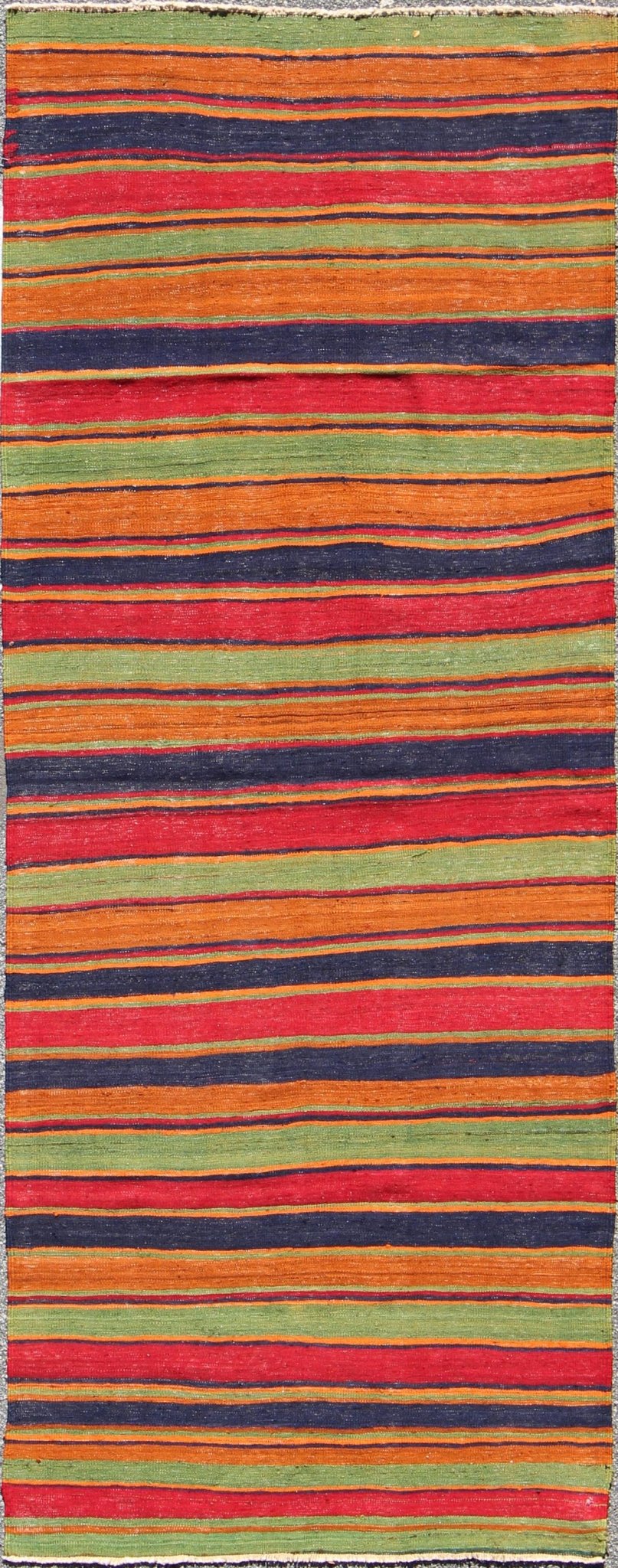 Vintage Kilim wide runner with horizontal stripes in orange, green, blue, red, gold, rug emd - 95028, country of origin / type: Turkey / Kilim, circa mid - 20th century Featuring a repeating horizontal stripe design, this unique mid - century Kilim sh... - Keivan Woven ArtsTU - EMD - 95028 - 3473Rug