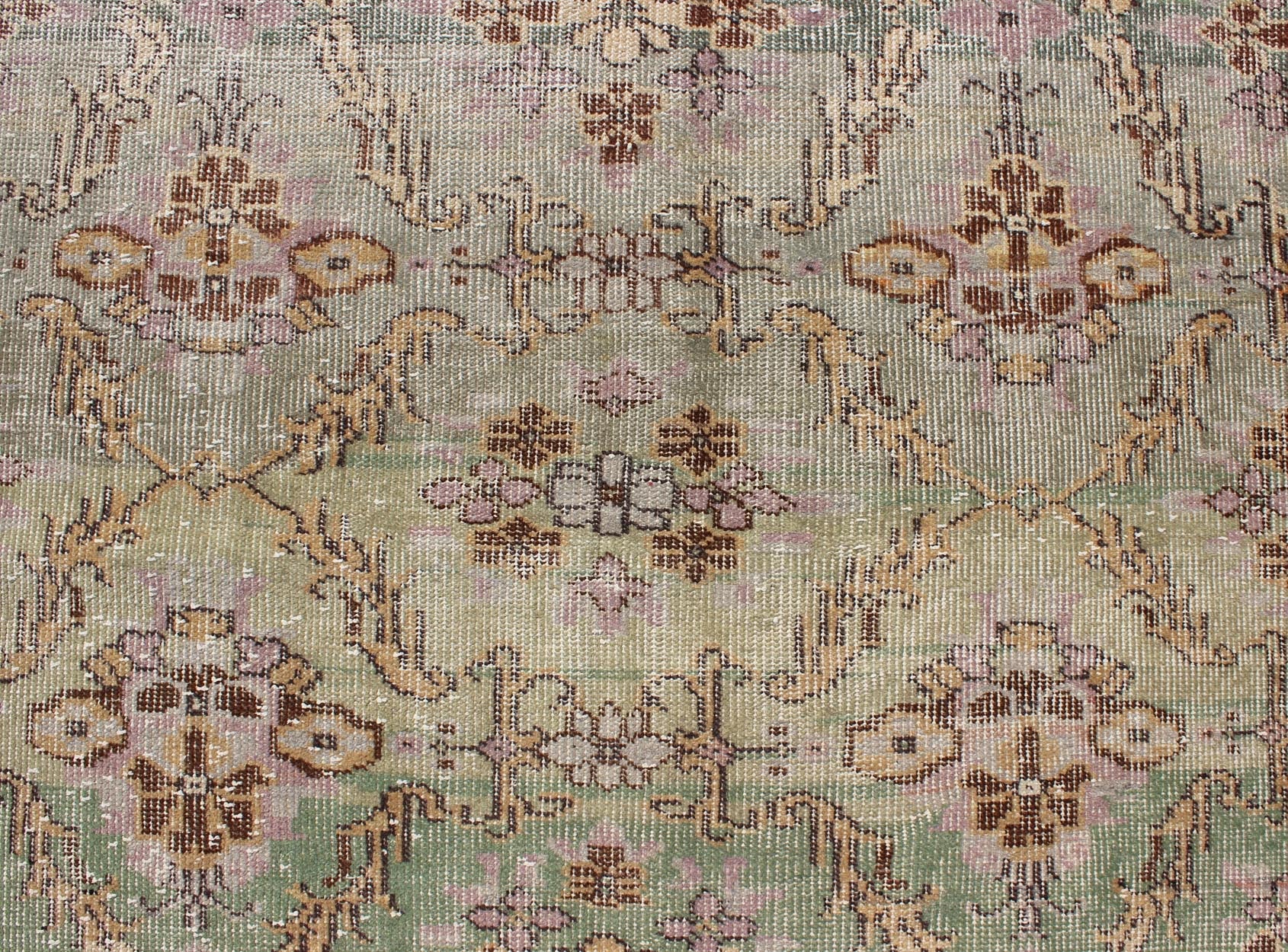 Distressed Vintage Turkish Art Deco Rug with All - Over Vining Flowers Design in Green And Lavender by Keivan Woven Arts/ rug/ TU - ERD - 4574, country of origin / type: Turkey / Art Deco, circa mid - 20th century Measures: 3'10 x 6'9. Alive with... - Keivan Woven ArtsTU - ERD - 4574 - 4942Rug