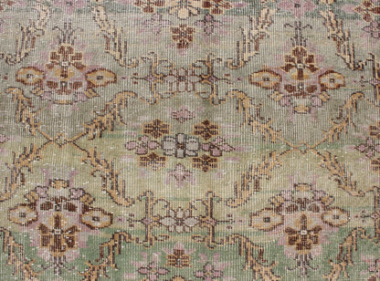 Distressed Vintage Turkish Art Deco Rug with All - Over Vining Flowers Design in Green And Lavender by Keivan Woven Arts/ rug/ TU - ERD - 4574, country of origin / type: Turkey / Art Deco, circa mid - 20th century Measures: 3'10 x 6'9. Alive with... - Keivan Woven ArtsTU - ERD - 4574 - 4942Rug