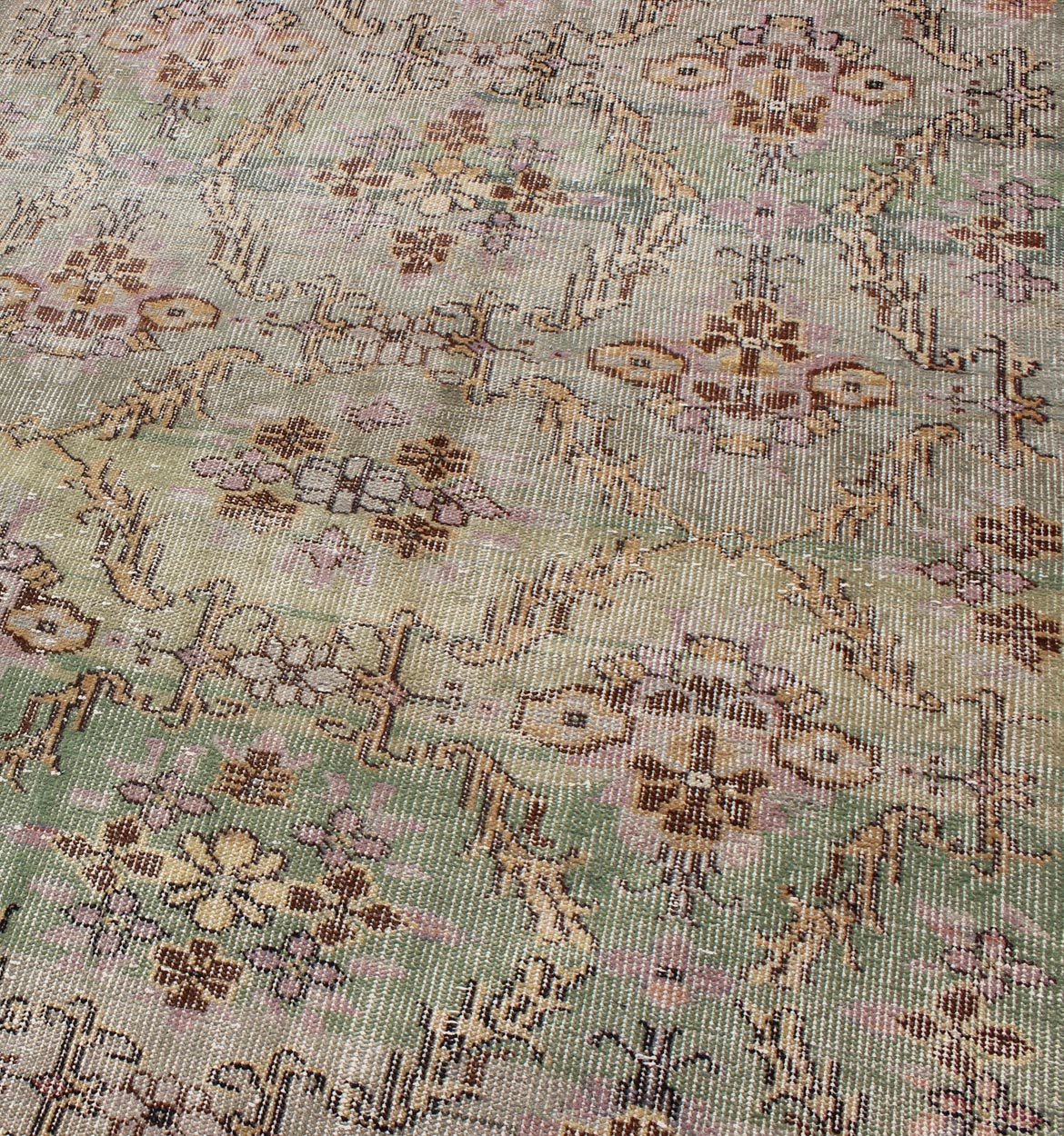 Distressed Vintage Turkish Art Deco Rug with All - Over Vining Flowers Design in Green And Lavender by Keivan Woven Arts/ rug/ TU - ERD - 4574, country of origin / type: Turkey / Art Deco, circa mid - 20th century Measures: 3'10 x 6'9. Alive with... - Keivan Woven ArtsTU - ERD - 4574 - 4942Rug