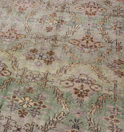 Distressed Vintage Turkish Art Deco Rug with All - Over Vining Flowers Design in Green And Lavender by Keivan Woven Arts/ rug/ TU - ERD - 4574, country of origin / type: Turkey / Art Deco, circa mid - 20th century Measures: 3'10 x 6'9. Alive with... - Keivan Woven ArtsTU - ERD - 4574 - 4942Rug