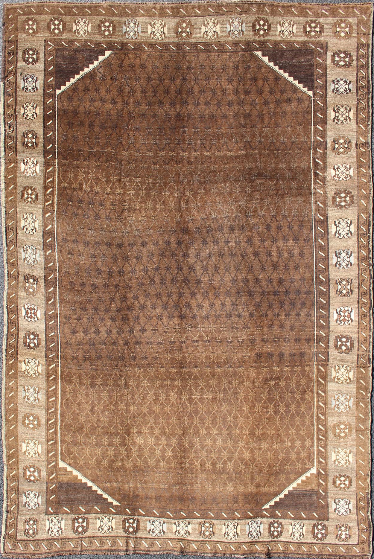 Vintage Turkish Kars Rug With a All - Over Lattce Design in Brown Tones This striking vintage Turkish carpet, from the mountainous eastern Turkey, bears a beautiful base palette of warm sienna with decorative elements in ivory. The central fie... - Keivan Woven ArtsTU - HAC - 09 - 2414Rug