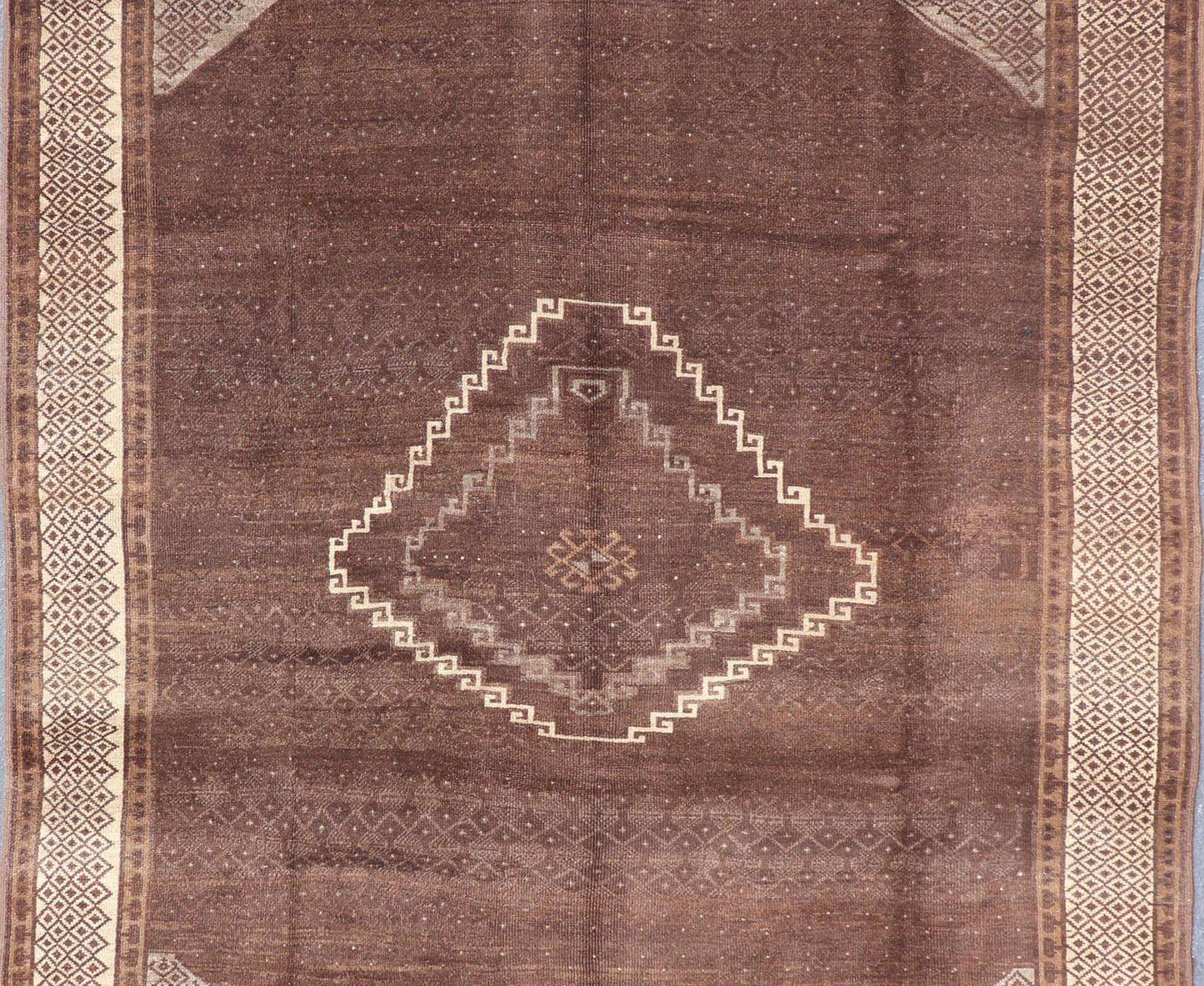 Vintage Turkish Kars Rug with a Modern Design in Shades of Brown and Ivory. Measures: 7'7 x 10'4. This wonderful Turkish rug, from eastern Turkey, displays a chocolate brown background with a small, repeating geometric pattern in the background a... - Keivan Woven ArtsTU - IHS - 123002 - 3648Rug