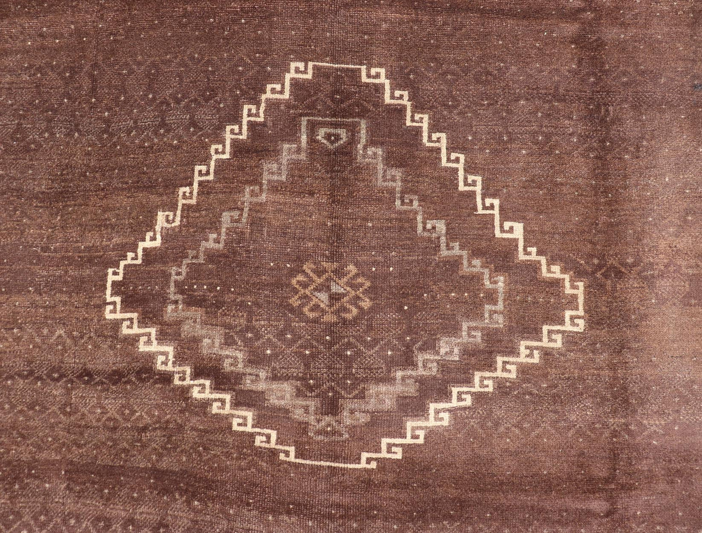 Vintage Turkish Kars Rug with a Modern Design in Shades of Brown and Ivory. Measures: 7'7 x 10'4. This wonderful Turkish rug, from eastern Turkey, displays a chocolate brown background with a small, repeating geometric pattern in the background a... - Keivan Woven ArtsTU - IHS - 123002 - 3648Rug