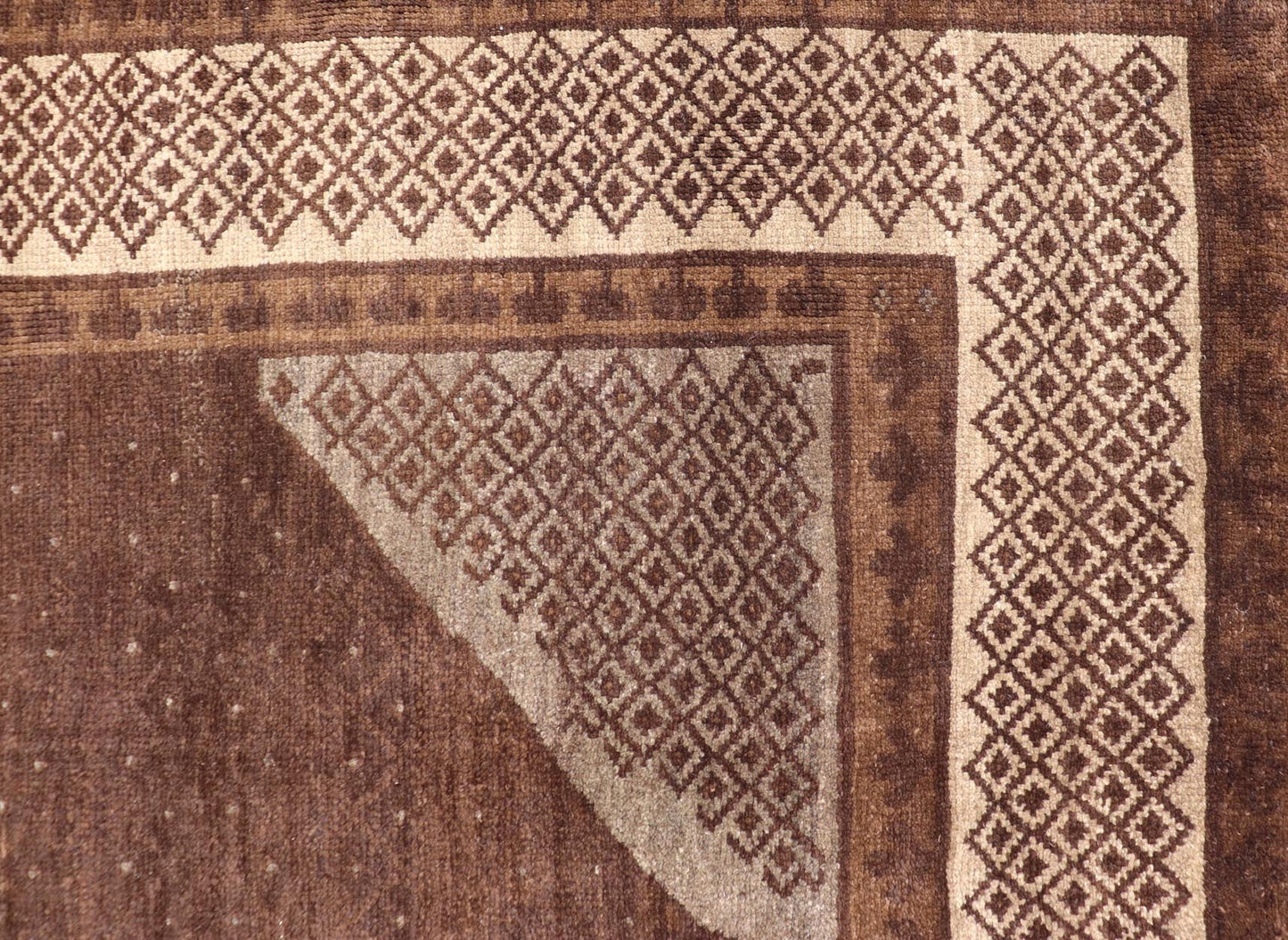 Vintage Turkish Kars Rug with a Modern Design in Shades of Brown and Ivory. Measures: 7'7 x 10'4. This wonderful Turkish rug, from eastern Turkey, displays a chocolate brown background with a small, repeating geometric pattern in the background a... - Keivan Woven ArtsTU - IHS - 123002 - 3648Rug