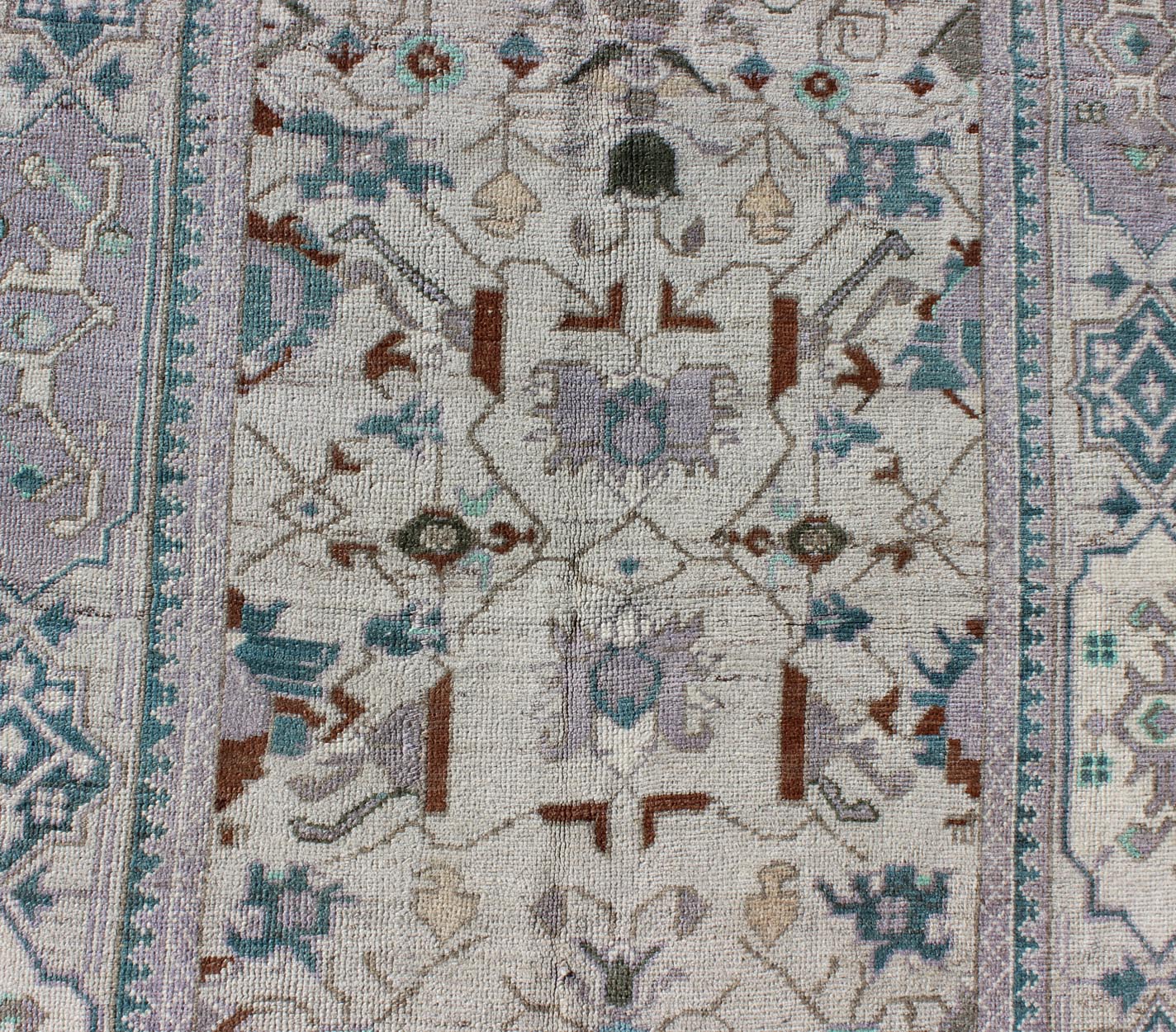 Vintage All - Over Floral Turkish Oushak Area Rug in Cream, Blue, Lilac and Red Measures: 4'4 x 8 This vintage Turkish Oushak carpet (circa mid - 20th century) features an all - over design of sub - geometric floral motifs atop of a creamy backgr... - Keivan Woven ArtsTU - IHS - 123347 - 3638Rug