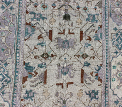 Vintage All - Over Floral Turkish Oushak Area Rug in Cream, Blue, Lilac and Red Measures: 4'4 x 8 This vintage Turkish Oushak carpet (circa mid - 20th century) features an all - over design of sub - geometric floral motifs atop of a creamy backgr... - Keivan Woven ArtsTU - IHS - 123347 - 3638Rug