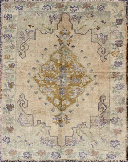 Classic Medallion Oushak Vintage Rug in Taupe, Purple, Cream, and Green This soft and cheerful Oushak carpet proudly displays a unique color combination in any carpet. On the center of this rug lays a central medallion of rich gold color. T... - Keivan Woven ArtsTU - IHS - 123408 - 3644Rug