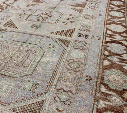 Lavender and teal vintage Turkish Oushak rug with tribal / geometric medallions. Keivan Woven Arts / rug TU - IHS - 95156, country of origin type: Turkey Oushak, circa mid - 20th century The lavender background of this vintage Oushak rug from Turkey (... - Keivan Woven ArtsTU - IHS - 95156 - 4554Rug