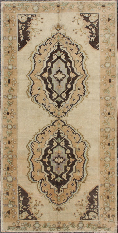 Vintage Turkish Oushak Gallery Rug with Two Medallions in Taupe, Brown and Cream Measures: 4'11 x 10'4. This beautiful vintage Oushak gallery rug from mid - 20th century Turkey features a Classic Oushak design. The faint sand ground is ho... - Keivan Woven ArtsTU - ISA - 3363 - 5744Rug