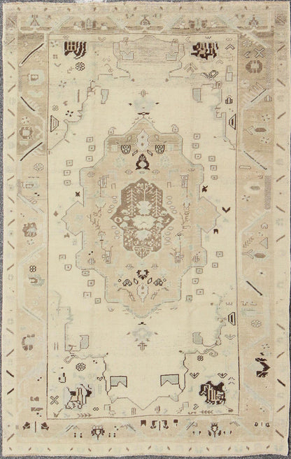 Ivory Background Vintage Turkish Oushak Rug with Tribal Medallion and Motifs kwarugs Ivory background vintage Turkish Oushak rug with tribal medallion and motifs, rug isa - 3394, country of origin / type: Turkey / Oushak, circa mid - 20th century. ... - Keivan Woven ArtsTU - ISA - 3394 - 5750Rug