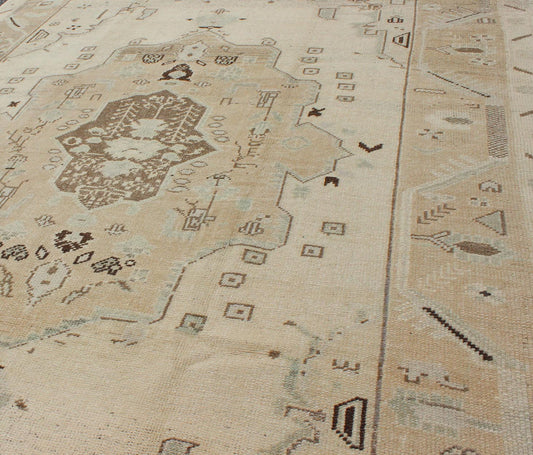 Ivory Background Vintage Turkish Oushak Rug with Tribal Medallion and Motifs kwarugs Ivory background vintage Turkish Oushak rug with tribal medallion and motifs, rug isa - 3394, country of origin / type: Turkey / Oushak, circa mid - 20th century. ... - Keivan Woven ArtsTU - ISA - 3394 - 5750Rug