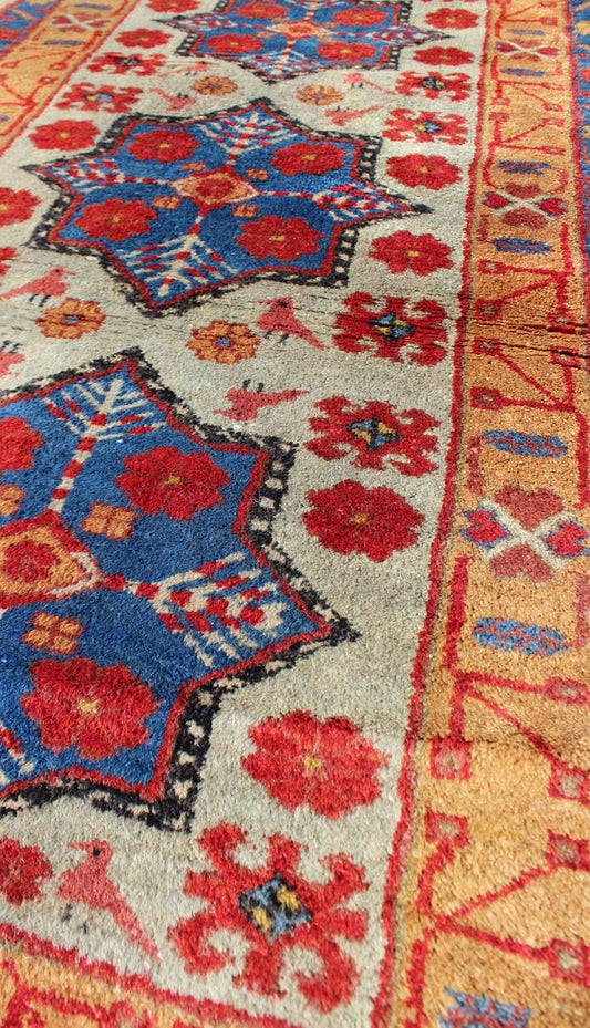 Vintage Turkish Rug with Star Design in light Green, Orange, Red & Blue. Mid century Turkish rug with very fine wool and in excellent condition, Keivan Woven Arts rug/TU - MEV - 3350. This colorful vintage Turkish carpet from the mid 20th century f... - Keivan Woven ArtsTU - MEV - 3350 - 5758