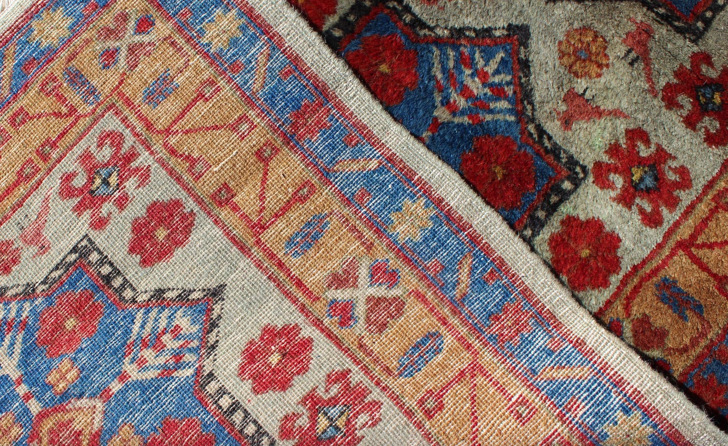 Vintage Turkish Rug with Star Design in light Green, Orange, Red & Blue. Mid century Turkish rug with very fine wool and in excellent condition, Keivan Woven Arts rug/TU - MEV - 3350. This colorful vintage Turkish carpet from the mid 20th century f... - Keivan Woven ArtsTU - MEV - 3350 - 5758Rug