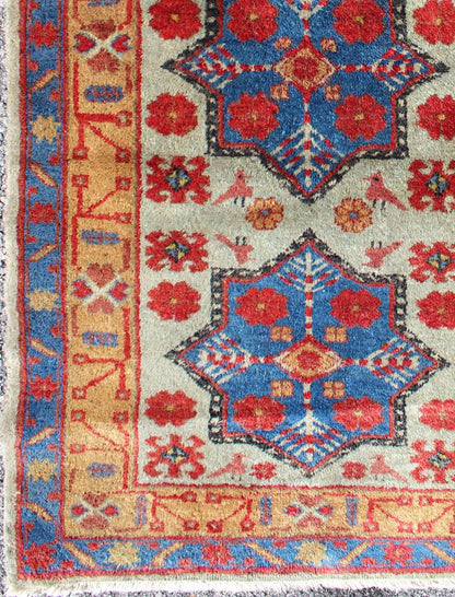 Vintage Turkish Rug with Star Design in light Green, Orange, Red & Blue. Mid century Turkish rug with very fine wool and in excellent condition, Keivan Woven Arts rug/TU - MEV - 3350. This colorful vintage Turkish carpet from the mid 20th century f... - Keivan Woven ArtsTU - MEV - 3350 - 5758Rug
