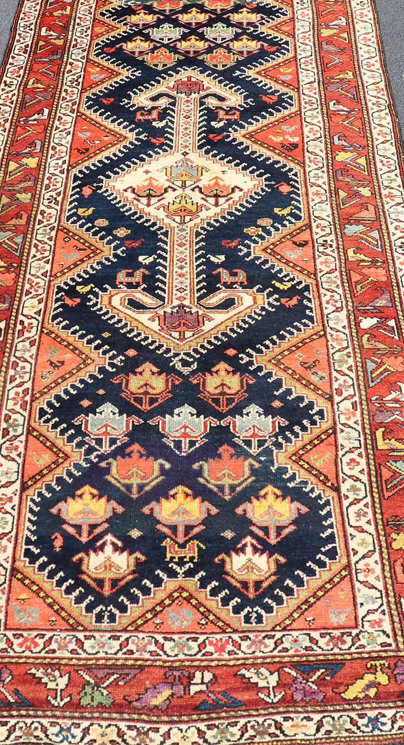 Antique Persian Qashqai Runner with Geometric Medallion Design in Vivid Colors Qashqai antique runner in multi - colors with multi - medallion geometric design, rug TU - MEV - PM809, Keivan Woven Arts / country of origin / type: Iran / Qashqai , circa ... - Keivan Woven ArtsTU - MEV - PM809 - 17020Rug