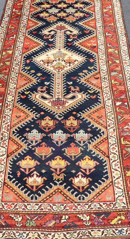 Antique Persian Qashqai Runner with Geometric Medallion Design in Vivid Colors Qashqai antique runner in multi - colors with multi - medallion geometric design, rug TU - MEV - PM809, Keivan Woven Arts / country of origin / type: Iran / Qashqai , circa ... - Keivan Woven ArtsTU - MEV - PM809 - 17020Rug