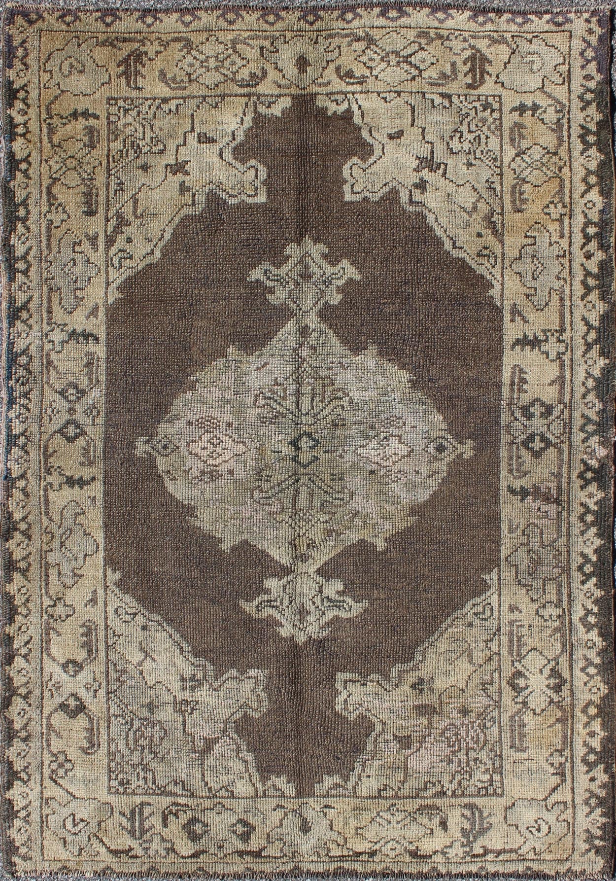 Chocolate Background Vintage Turkish Oushak Rug with Floral Medallion in Cream Chocolate background vintage Turkish Oushak rug with floral medallion in cream, Keivan Woven Arts / rug/TU - MOZ - 08, country of origin / type: Turkey / Oushak, circa mi... - Keivan Woven ArtsTU - MOZ - 08 - 2422Rug