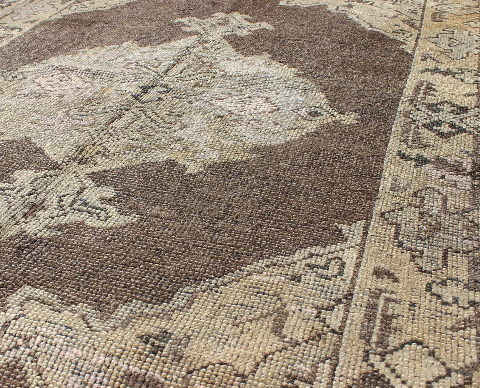 Chocolate Background Vintage Turkish Oushak Rug with Floral Medallion in Cream Chocolate background vintage Turkish Oushak rug with floral medallion in cream, Keivan Woven Arts / rug/TU - MOZ - 08, country of origin / type: Turkey / Oushak, circa mi... - Keivan Woven ArtsTU - MOZ - 08 - 2422Rug