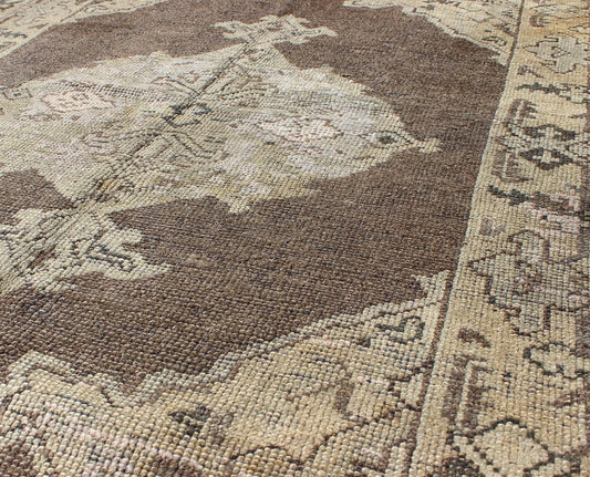 Chocolate Background Vintage Turkish Oushak Rug with Floral Medallion in Cream Chocolate background vintage Turkish Oushak rug with floral medallion in cream, Keivan Woven Arts / rug/TU - MOZ - 08, country of origin / type: Turkey / Oushak, circa mi... - Keivan Woven ArtsTU - MOZ - 08 - 2422