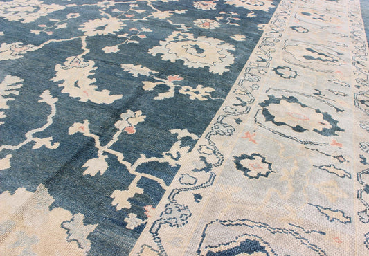 Large Turkish Oushak Rug with Dark Teal Blue Background & Ice Blue Border. Turkish large Oushak rug with large flower design in Teal Blue , ice blue/ gray and accent colors of coral and butter. Turkish Oushak all - over floral design, rug TU... - Keivan Woven ArtsTU - MSD - 43 - 6833Rug